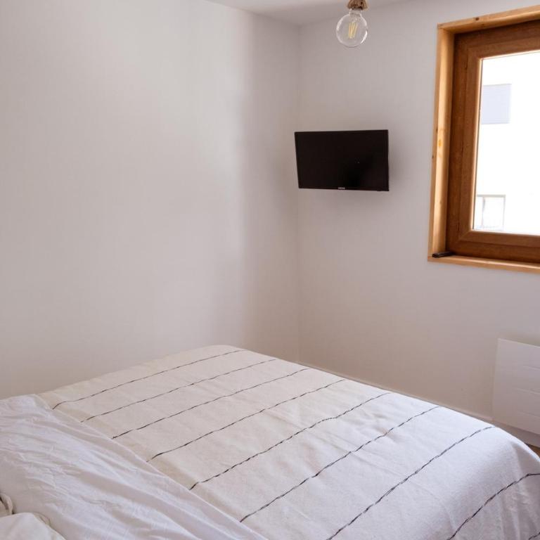 Appartement moderne et spacieux avec poêle à bois et balcon - Appartement - 46