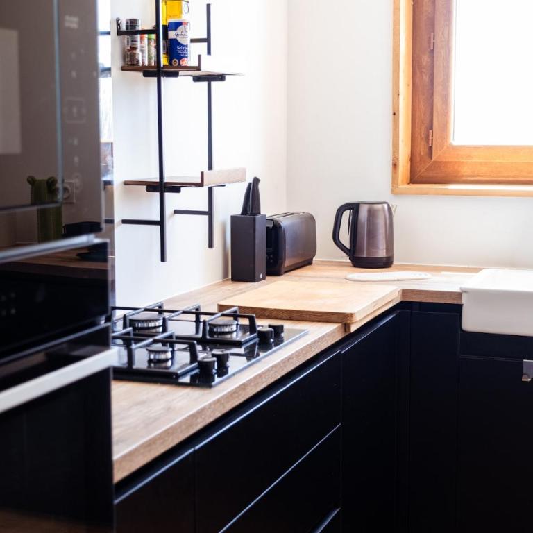 Appartement moderne et spacieux avec poêle à bois et balcon - Appartement - 50