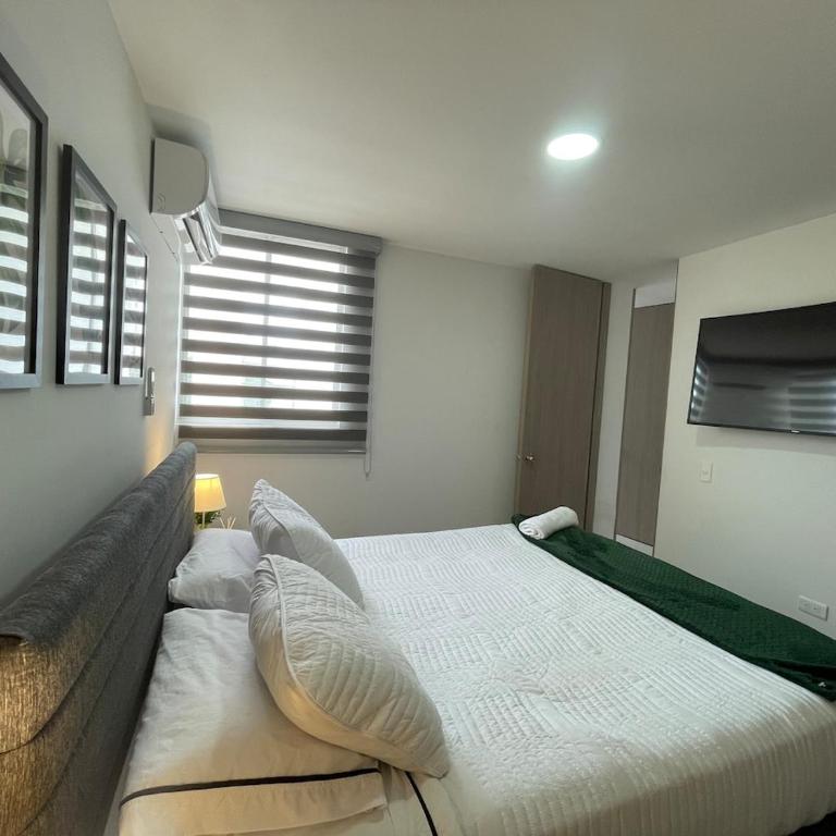 Apartamento cerca al aeropuerto con 3 habitaciones - Three-Bedroom Apartment - 22