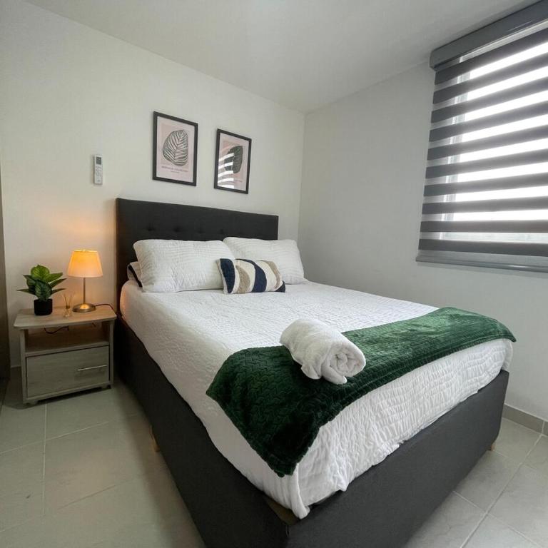 Apartamento cerca al aeropuerto con 3 habitaciones - Three-Bedroom Apartment - 18