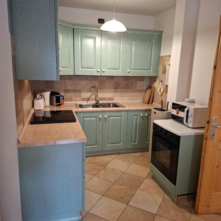 Casa Brenta Mavignola 3 bedrooms Alpine charm - Three-Bedroom Apartment with Mountain View - 13