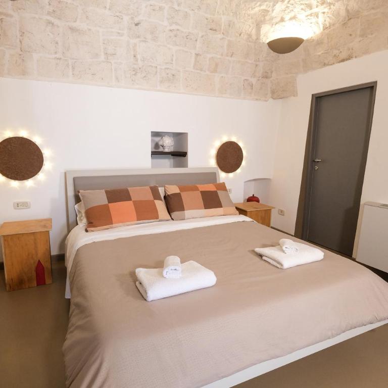Pavì Trulli e Suites - Camera Familiare con Vista Giardino - 14
