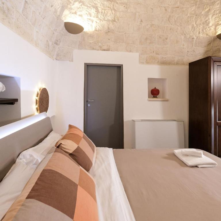 Pavì Trulli e Suites - Camera Familiare con Vista Giardino - 15
