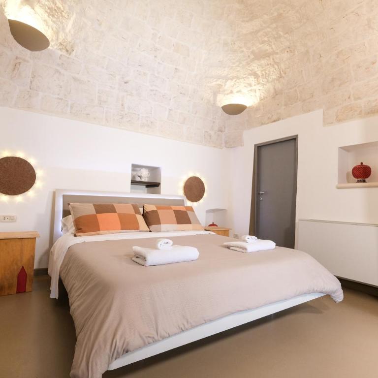 Pavì Trulli e Suites - Camera Familiare con Vista Giardino - 16
