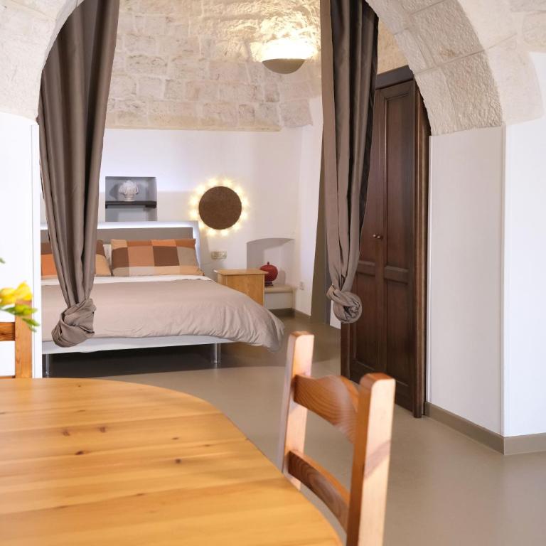 Pavì Trulli e Suites - Camera Familiare con Vista Giardino - 24