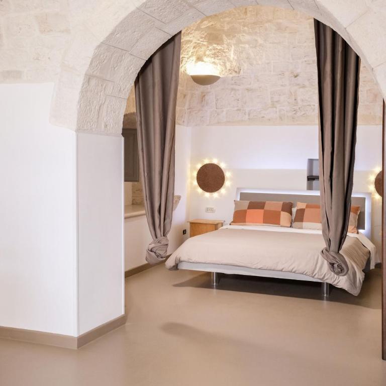 Pavì Trulli e Suites - Camera Familiare con Vista Giardino - 25