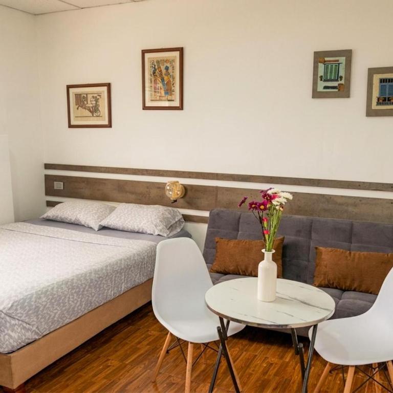 Villa 97 guayaquil Suites y Habitaciones Económicas Cerca del Aeropuerto - Habitación Superior - 1 cama grande - 1