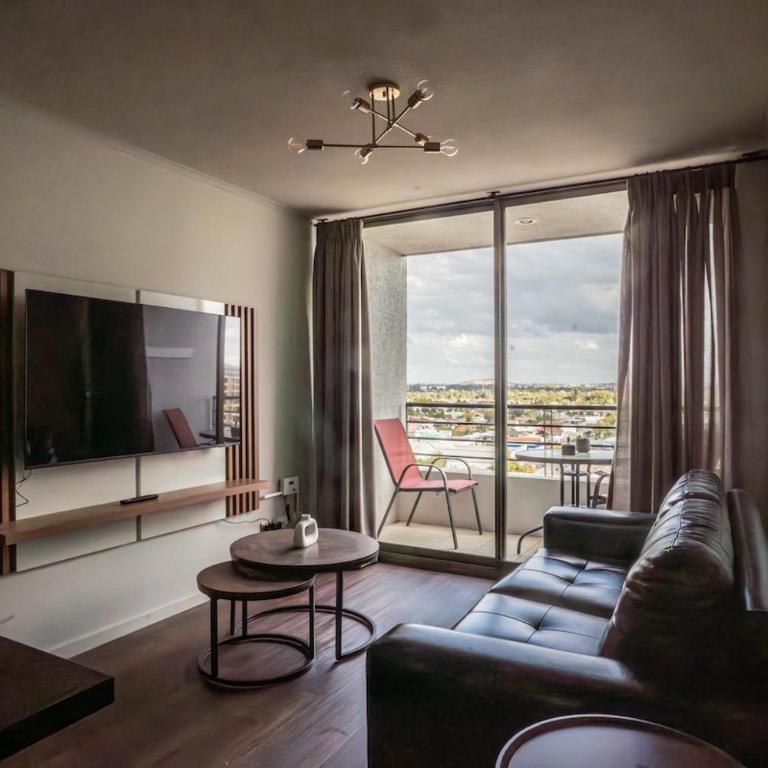 Moderno departamento en centro Talca - Estacionamiento y WiFi - Two-Bedroom Apartment with City View - 1