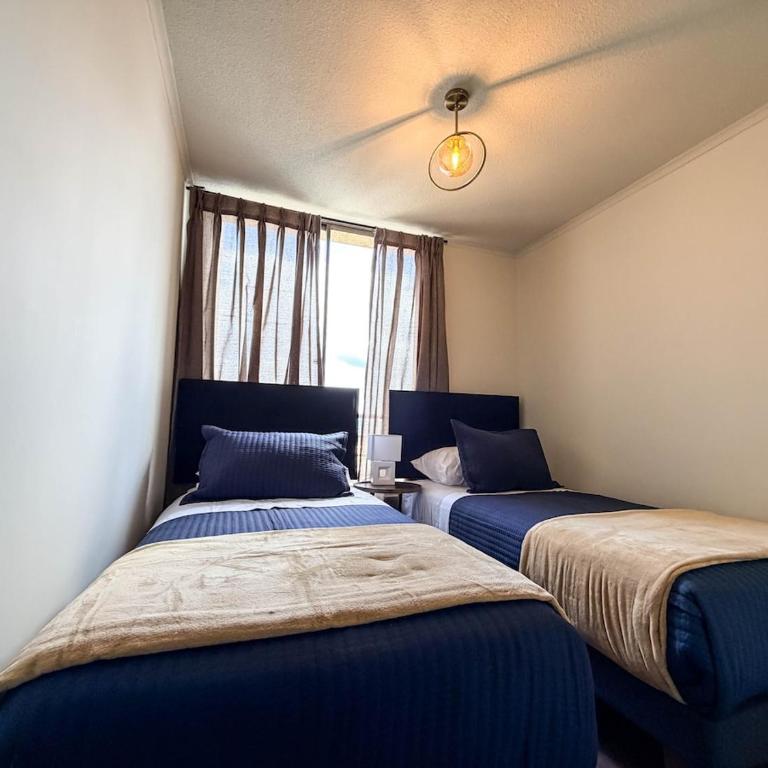 Moderno departamento en centro Talca - Estacionamiento y WiFi - Two-Bedroom Apartment with City View - 7