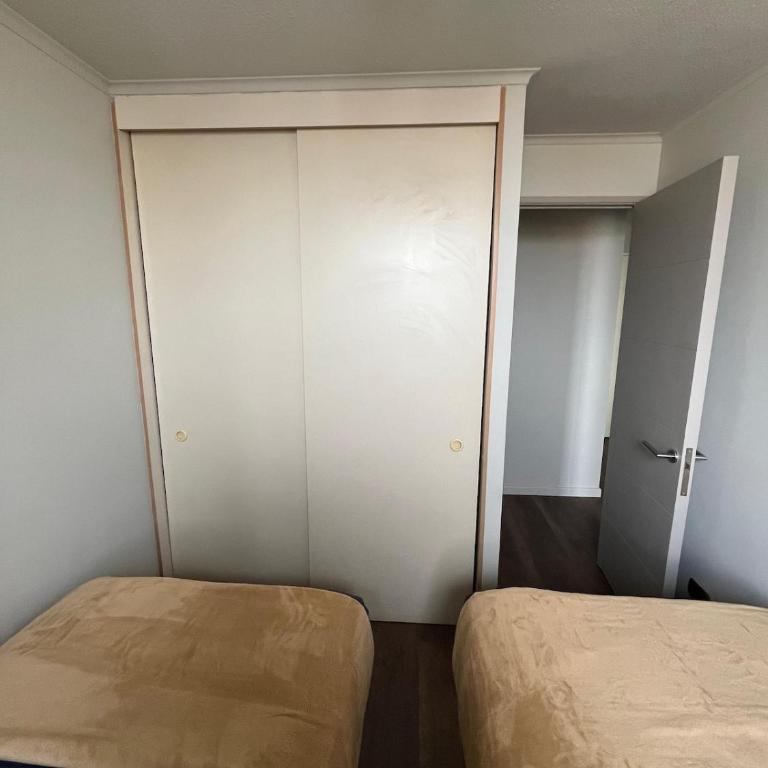 Moderno departamento en centro Talca - Estacionamiento y WiFi - Two-Bedroom Apartment with City View - 8