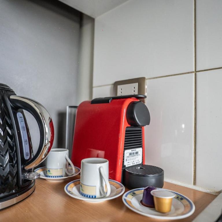 Moderno departamento en centro Talca - Estacionamiento y WiFi - Two-Bedroom Apartment with City View - 14