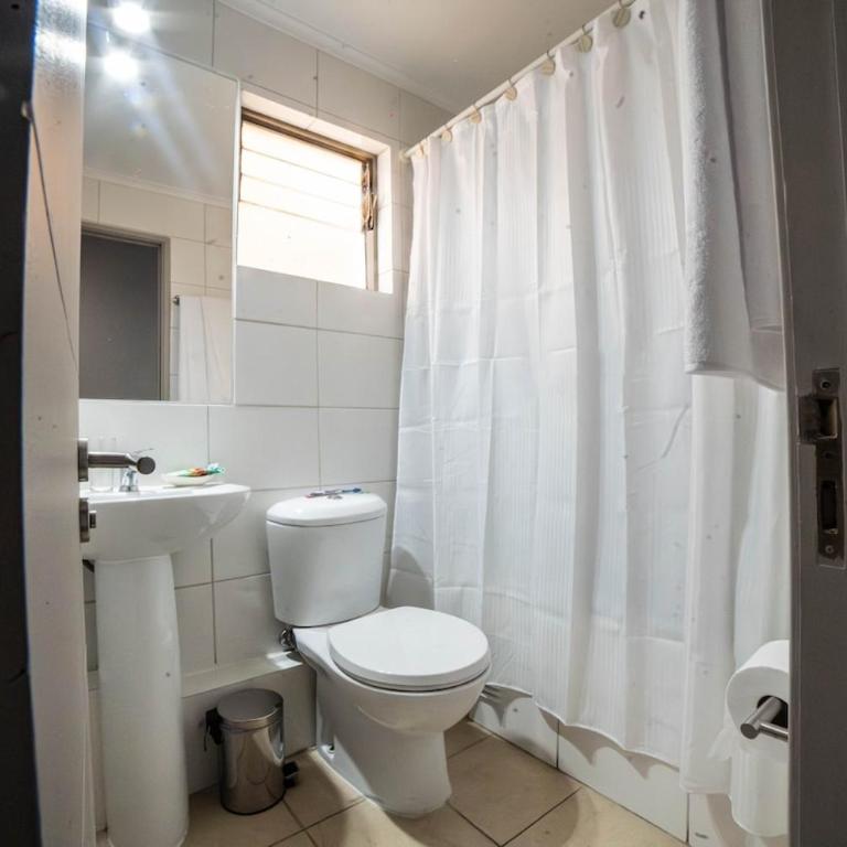 Moderno departamento en centro Talca - Estacionamiento y WiFi - Two-Bedroom Apartment with City View - 27