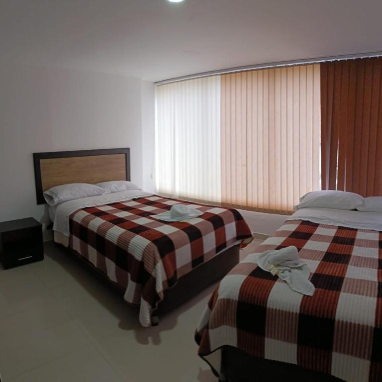 Hotel the Blue House - Habitación Doble con baño privado - 2 camas - 1