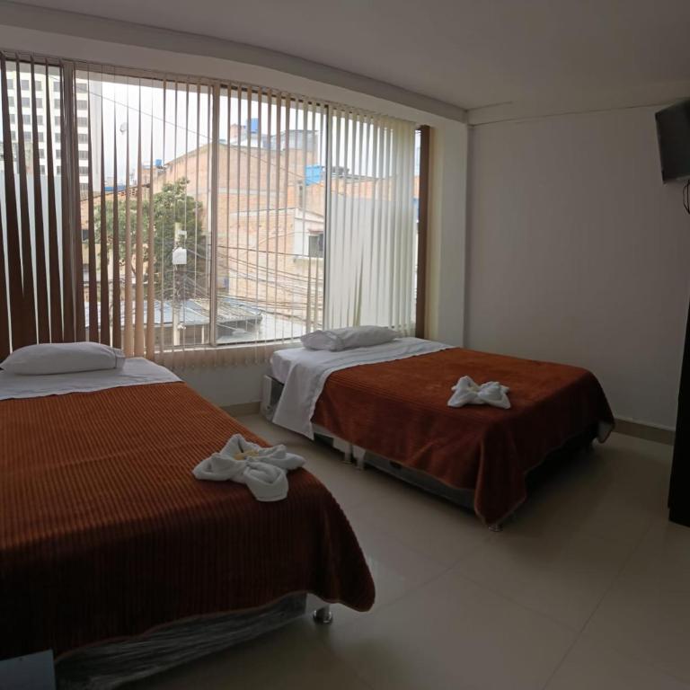 Hotel the Blue House - Habitación Doble con baño privado - 2 camas - 3