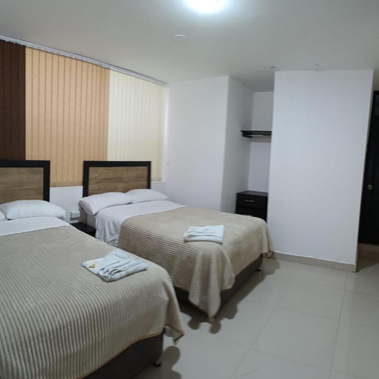 Hotel the Blue House - Habitación Doble con baño privado - 2 camas - 4