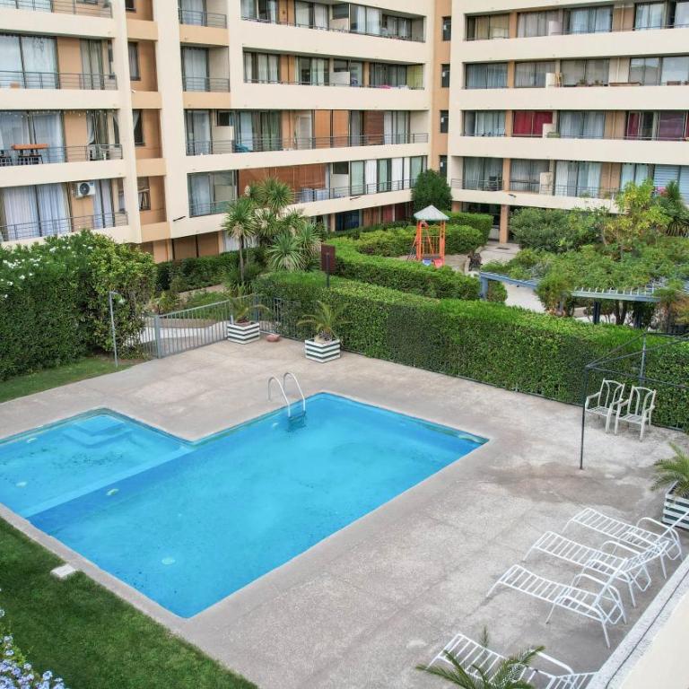 Moderno departamento en centro Talca - Estacionamiento y WiFi - Two-Bedroom Apartment with City View - 32