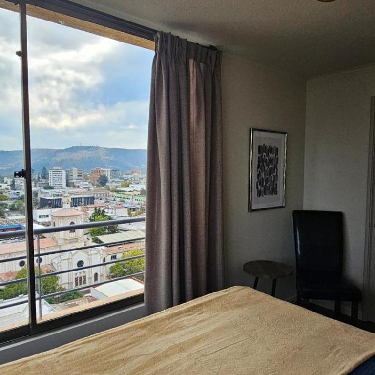 Moderno departamento en centro Talca - Estacionamiento y WiFi - Two-Bedroom Apartment with City View - 10