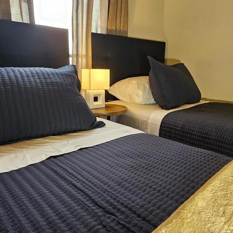 Moderno departamento en centro Talca - Estacionamiento y WiFi - Two-Bedroom Apartment with City View - 6