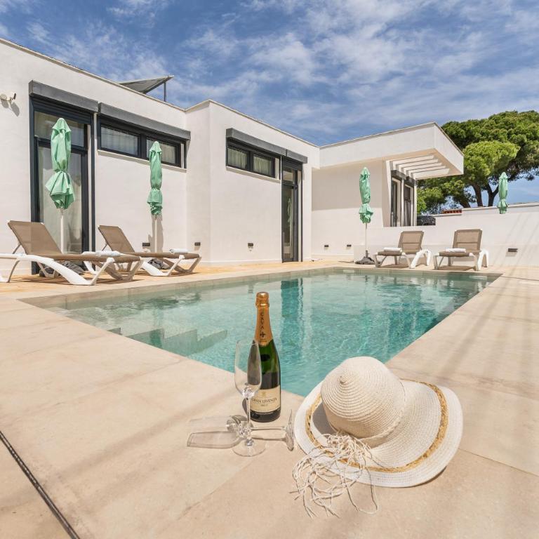 Casa Gerda modernes Haus mit Pool, ACs und Heizung, strandnah - Casa de 2 dormitorios - 1
