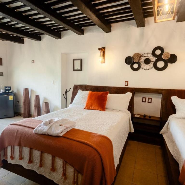 Kuxtal Hotel Boutique - Deluxe 2 doubles, dining area, mini-bar, coffee maker - 5