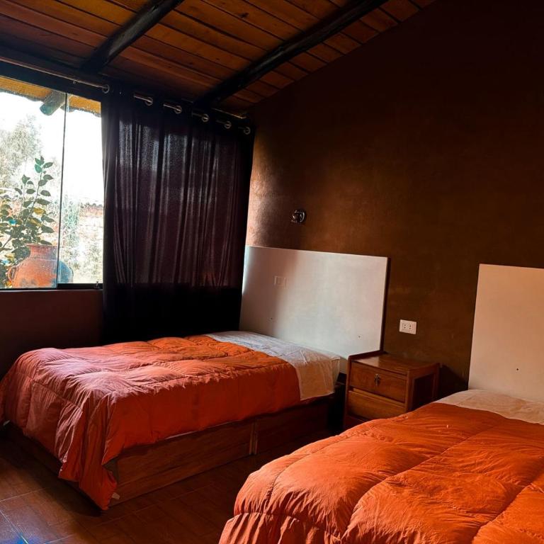 La Casa de Tay - Family Room with Garden View - 1
