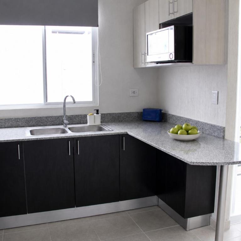 Kuxaan Cielo Terraza privada y comodidad a pocos minutos de la playa - Three-Bedroom Apartment - 39