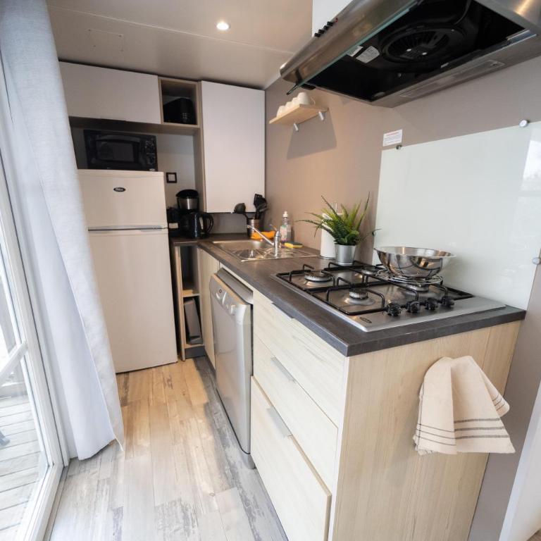 Mobil-home au Camping Castellas - Bungalow Deluxe - Vue sur Jardin - 6