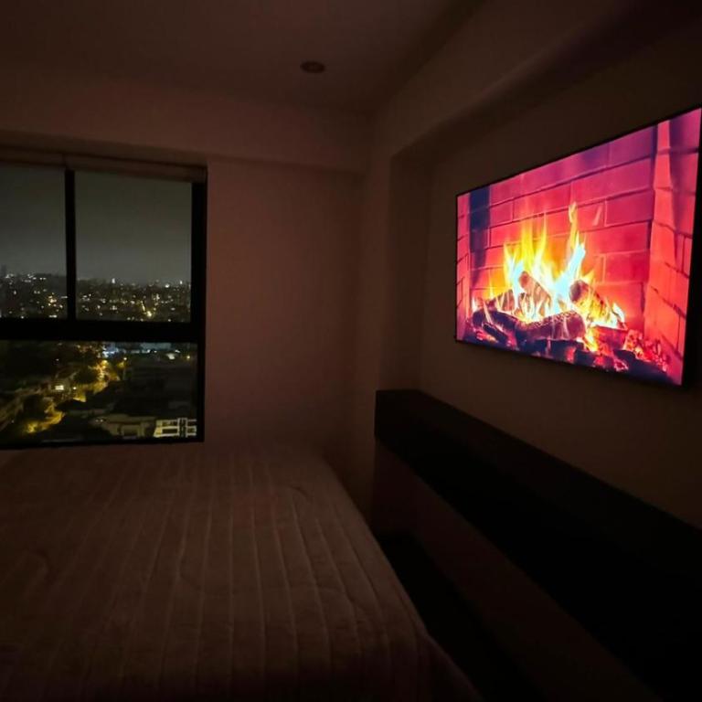 Habitaciones VISTAS A LA CIUDAD Y MAR - Habitación con cama grande y vistas al jardín - 2