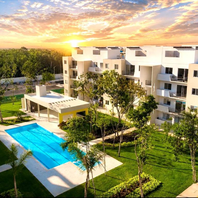 Kuxaan Cielo Terraza privada y comodidad a pocos minutos de la playa - Three-Bedroom Apartment - 16