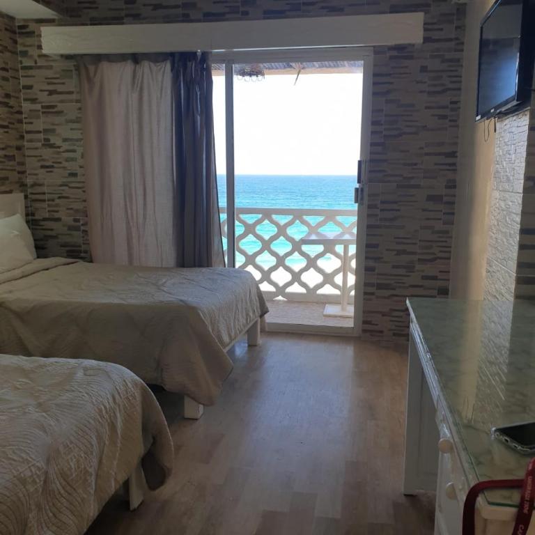 Caribbean View at Cancun Plaza Beachfront Condos - Estudio con vistas al mar - 25