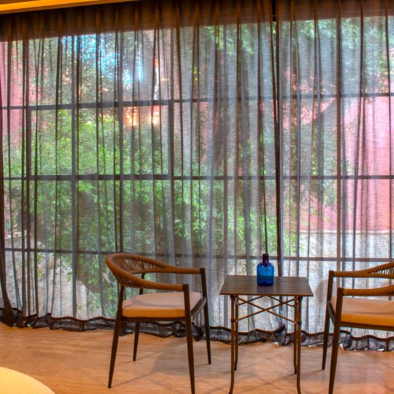 7 Casa Laurel Hotel Boutique - Deluxe Quadruple Room - 1
