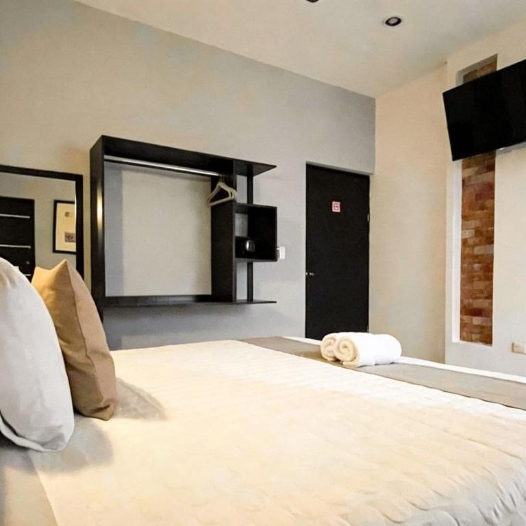 Hotel Zibahun - Estudio Triple Estándar - 11