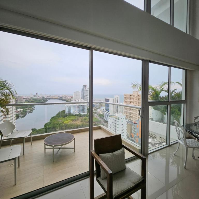 Duplex de Lujo nuevo con vista increible al centro y la playa - Two-Bedroom Apartment - 1