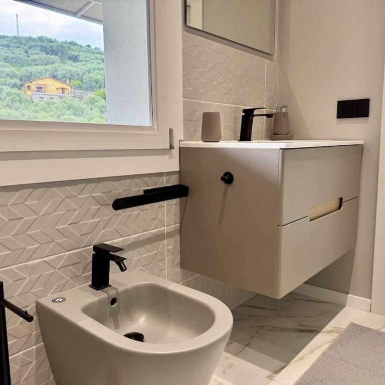 HOST4U - Dimora degli Ulivi, New House with Two Bedrooms, Terrace and Parking, 10 minutes to the beaCh - Appartamento con 2 Camere da Letto e Vista Giardino - 3