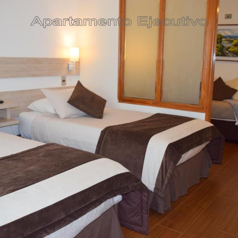Apart Hotel Cambiaso - Habitación Executive - 2 camas - 5