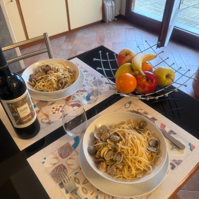 Attico in Piazza Matteotti - Appartamento con 2 Camere da Letto e Vista Lago - 50