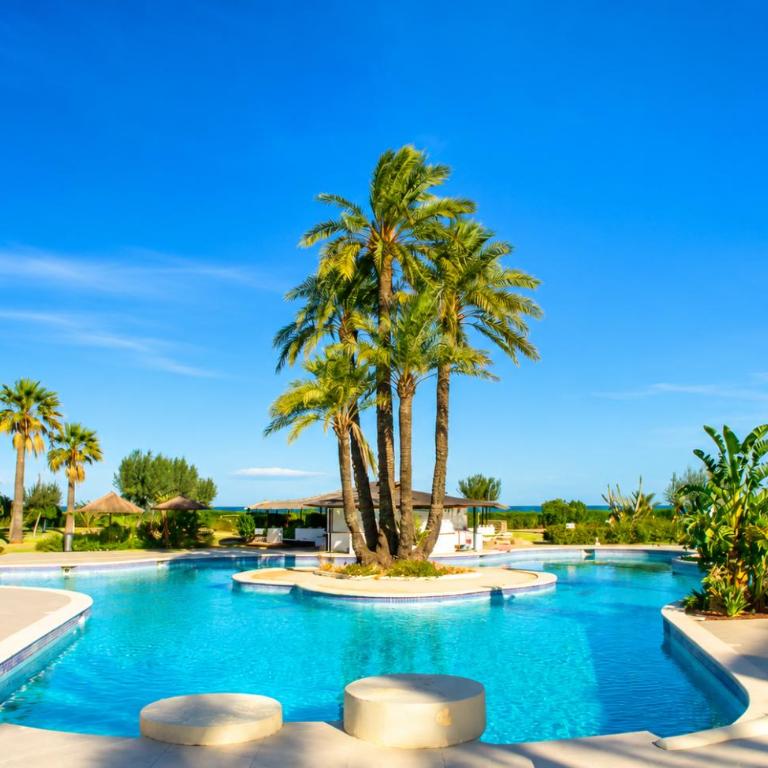 Apartamento Duna en Dénia, Urb Playa Grande, con vistas al jardín, piscina y acceso directo a la playa by Family Homes - Apartamento de 3 dormitorios - 1