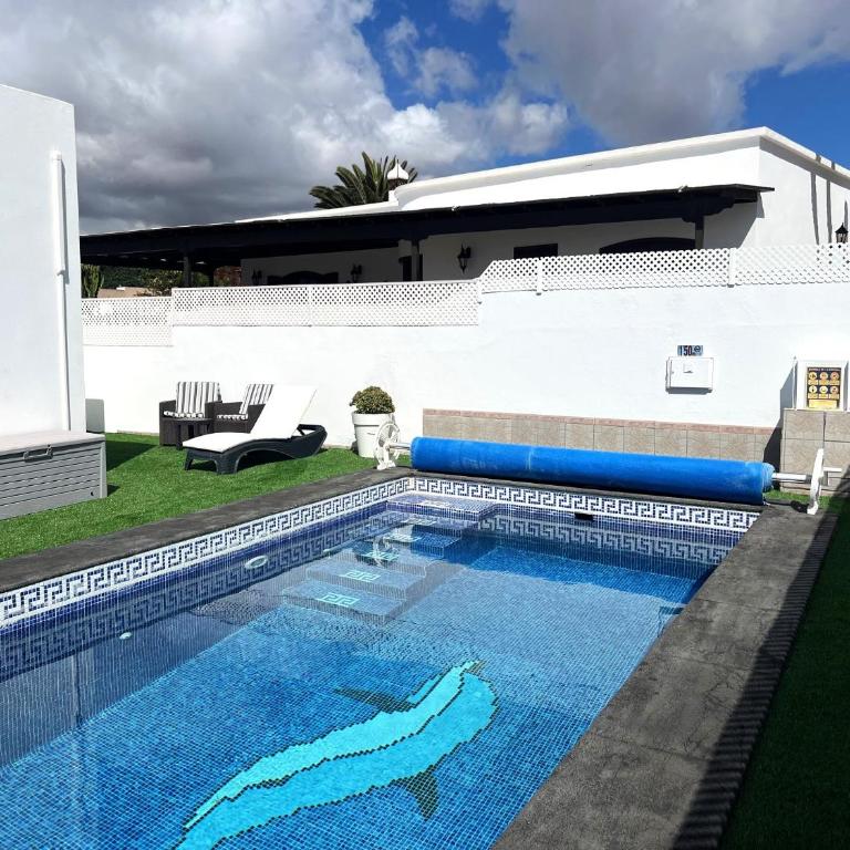 Villa Victoria just 150 metres from Playa Bastian Costa Teguise - Four-Bedroom Vacation Home - 53