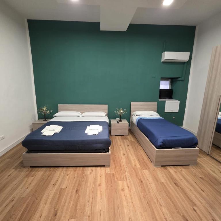 Vanzi Rooms - Premium Quadruple Room - 2