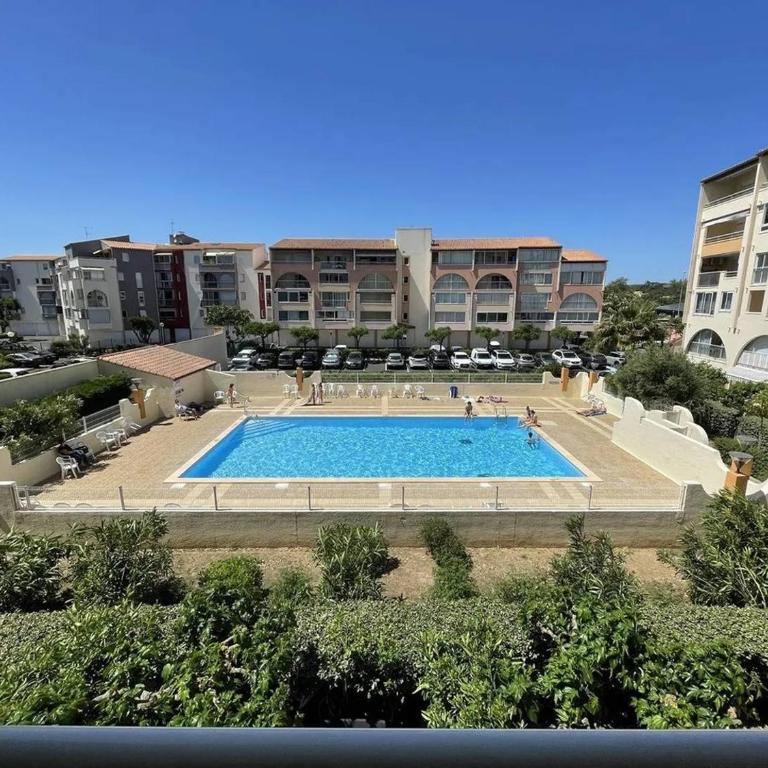 AQUAGOLF Jolie 2 Pièces cabine climatisée piscine proche plage Richelieu Cap d'Agde - Apartment mit 2 Schlafzimmern und Poolblick - 1