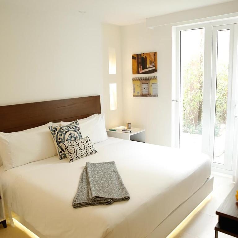 Nacar Hotel Cartagena, Curio Collection by Hilton - Habitación con cama extragrande. - 4
