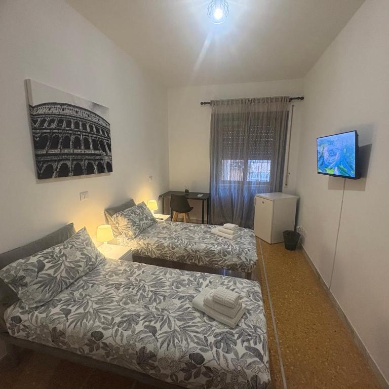 B&B Stelle Di Roma - Camera Matrimoniale/Doppia con Letti Singoli con Bagno in Comune - 19