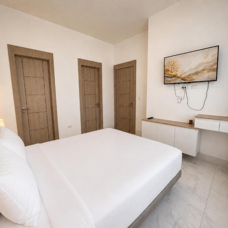 Elegante Apartamento en Torre Milenium La Aurora con Vista Urbana y Espacios Familiares Premium - Two-Bedroom Apartment - 7
