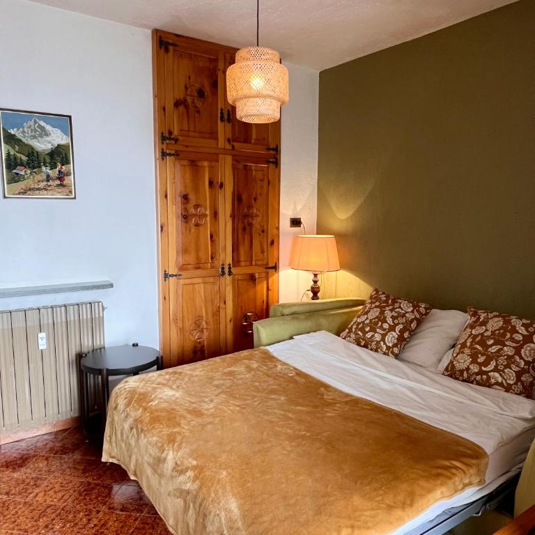 AlpNest - Appartamento con 1 Camera da Letto, Balcone e Vista Montagna - 1