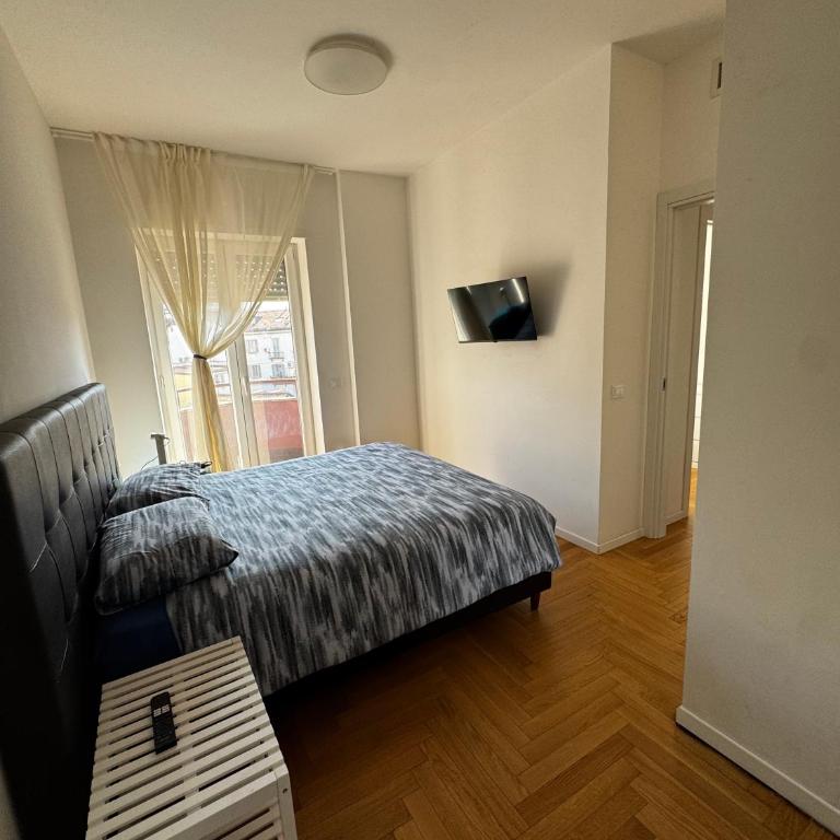 Trilocale Moderno con Terrazzo e Parcheggio - Appartamento con 2 Camere da Letto - 4