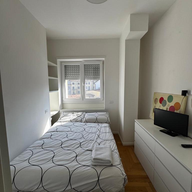 Trilocale Moderno con Terrazzo e Parcheggio - Appartamento con 2 Camere da Letto - 9