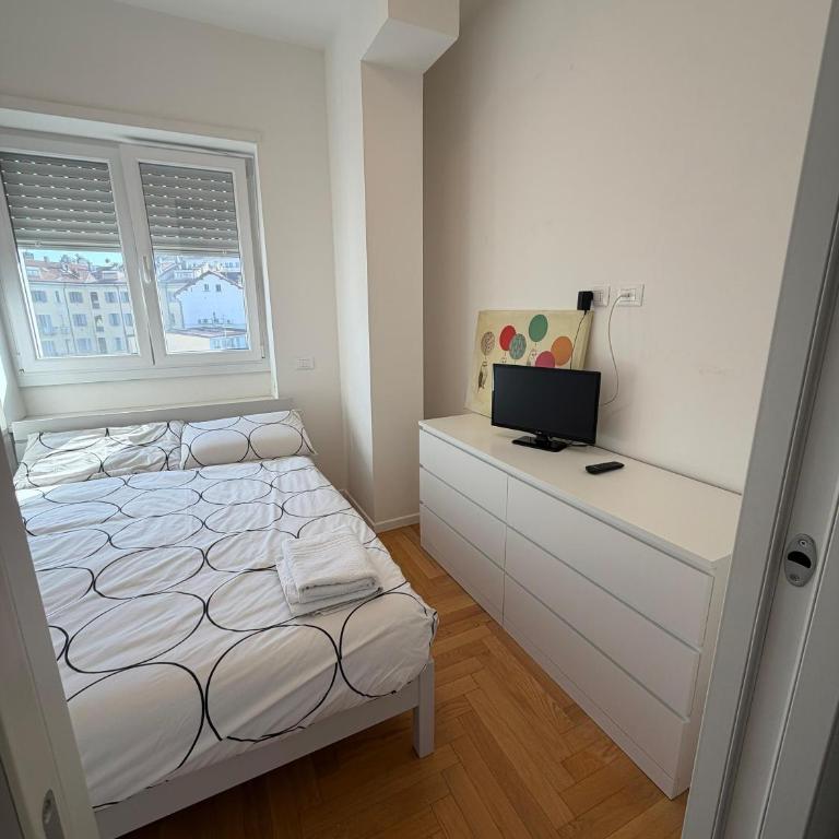 Trilocale Moderno con Terrazzo e Parcheggio - Appartamento con 2 Camere da Letto - 14