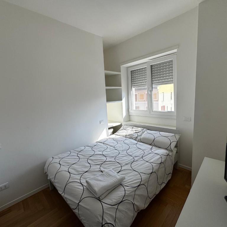 Trilocale Moderno con Terrazzo e Parcheggio - Appartamento con 2 Camere da Letto - 15