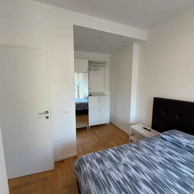 Trilocale Moderno con Terrazzo e Parcheggio - Appartamento con 2 Camere da Letto - 18