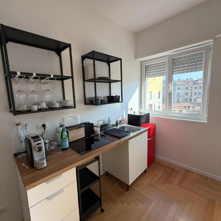 Trilocale Moderno con Terrazzo e Parcheggio - Appartamento con 2 Camere da Letto - 23